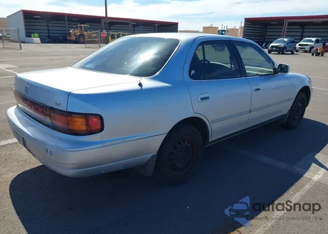1994 Toyota Camry Le z USA, uszkodzony, nr VIN JT2SK12E4R0206638